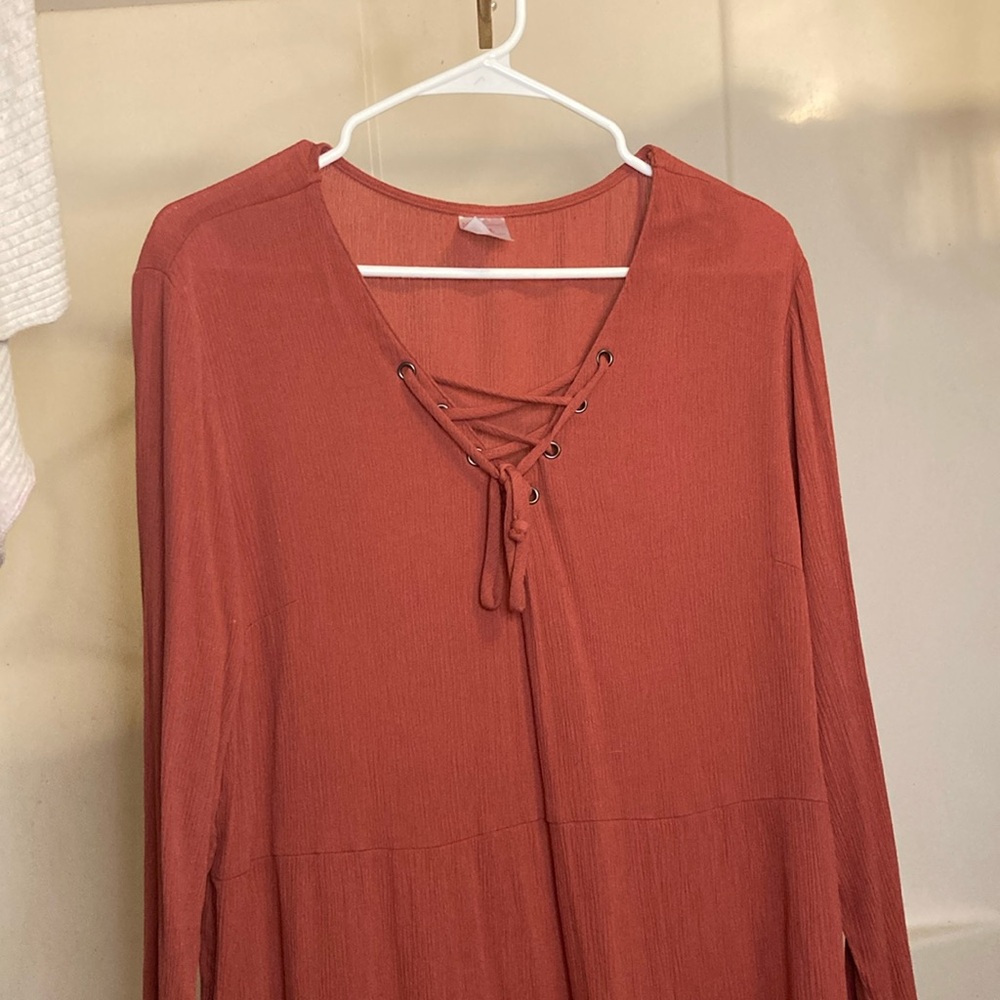 Coral long sleeved dress with tie in front